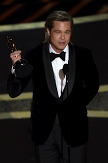 Brad Pitt accepts the award for best performance by an actor in a supporting role for "Once Upon a Time in Hollywood" at the Oscars on Sunday, Feb. 9, 2020, at the Dolby Theatre in Los Angeles.