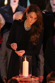 LONDON, ENGLAND - JANUARY 27: Catherine, Princess of Wales lights a candle during a ceremony commemorating Holocaust Memorial Day on January 27, 2025 in London, England. Prime Minister Keir Starmer and Prince William were among the British officials and celebrities who marked Holocaust Memorial Day and the 80th anniversary of the liberation of Auschwitz-Birkenau during World War II. (Photo by Dan Kitwood/Getty Images)
