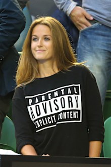 Kim Sears wears a Parental Advisory T-shirt during day 14 of the 2015 Australian Open at Melbourne Park on February 1, 2015 in Melbourne, Australia.