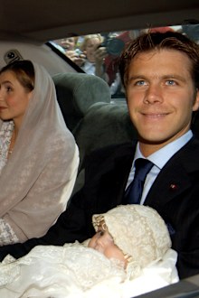 Emmanuel Filiberto of Savoy, grandson of Italy's last king, his daughter Vittoria and his wife Clotilde Courau arrive for the baptism ceremony at St. Francis Basilica on May 30, 2004 in Assisi, Italy. 