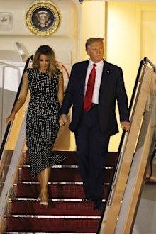 WEST PALM BEACH, FLORIDA - DECEMBER 23: U.S. President Donald Trump and First Lady Melania Trump exit from Air Force One at the Palm Beach International Airport on December 23, 2020 in West Palm Beach, Florida. President Trump is scheduled to enjoy a 10-day holiday visit at his Mar-a-Lago resort during the last Christmas of his precedency. (Photo by Joe Raedle/Getty Images)
