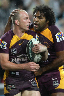 Darren Lockyer (left) with Sam Thaiday (Right) during match between the Brisbane Broncos and the Caterbury Bulldogs in 2011. (Getty Images).