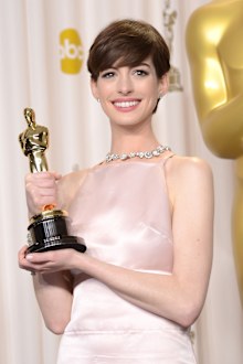 Anne Hathaway poses in the press room during the Oscars held at Loews Hollywood Hotel on February 24, 2013 in Hollywood, California.