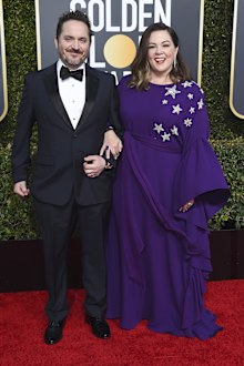 Ben Falcone, left, and Melissa McCarthy arrive at the 76th annual Golden Globe Awards at the Beverly Hilton Hotel on Sunday, Jan. 6, 2019, in Beverly Hills, Calif. (Photo by Jordan Strauss/Invision/AP)