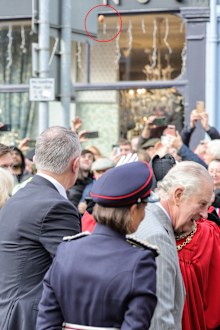 An egg (circled) is thrown by a member of the public as King Charles III and Camilla, Queen Consort arrive for the Welcoming Ceremony to the City of York at Micklegate Bar during an official visit to Yorkshire on November 09, 2022 in York, England.