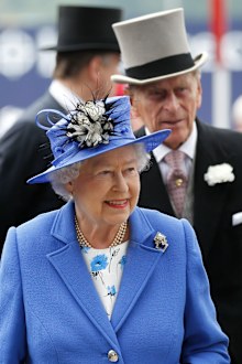 Queen Elizabeth and Prince Philip arrive for the Epsom Derby at Epsom race course, southern England at the start of four-day Diamond Jubilee celebrations to mark the 60th anniversary of the Queen's accession to the throne Saturday, June 2, 2012. 