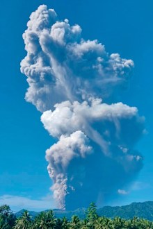 In this photo released by the Badan Geologi, the geological agency of Indonesia's Ministry of Energy and Mineral Resources, Mount Dukono releases volcanic materials during an eruption in North Halmahera in Indonesia.