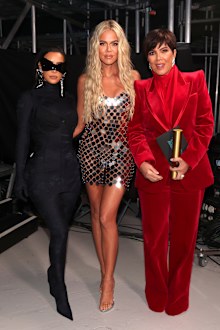 Kim Kardashian West, Khloé Kardashian, and Kris Jenner, winners of The Reality Show of 2021 award for Keeping Up With the Kardashians, pose during the 2021 People's Choice Awards held at Barker Hangar on December 7, 2021 in Santa Monica, California. 