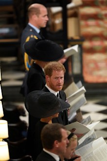 Prince William, Kate, Princess of Wales, Prince Harry and Meghan, Duchess of Sussex attend the committal service for Queen Elizabeth II at St George's Chapel.
