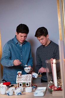 Crown Prince Christian and Prince Vincent of Denmark make a gingerbread house inside Frederik VIII's Palace at Amalienborg, December 2025.