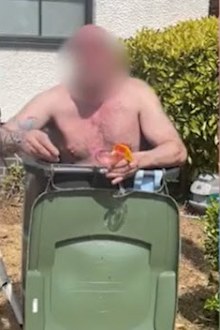 British man in wheelie bin heatwave