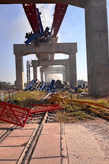 This photo released from State Railway of Thailand, shows a scene after a construction crane fell into a passenger train in Nakhon Ratchasima province, Thailand Wednesday, Jan. 14, 2026. (State Railway of Thailand via AP)