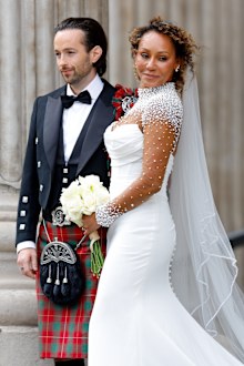 Rory McPhee and Mel B depart following their wedding in the OBE (Order of the British Empire) Chapel at St Paul's Cathedral on July 5, 2025 in  London, England. 