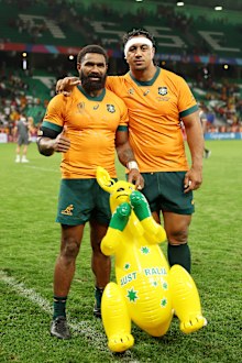 Marika Koroibete and Pone Fa'amausili of Australia pose for a photo at fulltime.