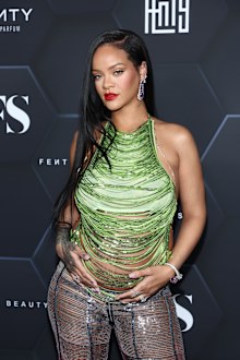 Rihanna poses for a picture as she celebrates her beauty brands fenty beauty and fenty skin at Goya Studios on February 11, 2022 in Los Angeles, California. 