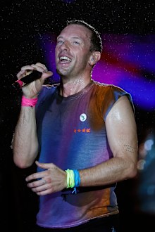 Chris Martin of the band Coldplay performs at the Mundo Stage during the Rock in Rio Festival at Cidade do Rock on September 10, 2022