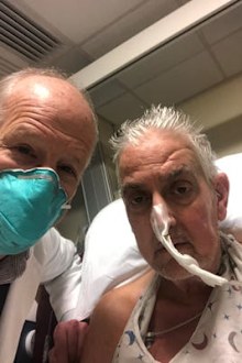 Dave Bennett (right) received a pig heart in a world first. Here he is pictured with lead surgeon Bartley Griffin.