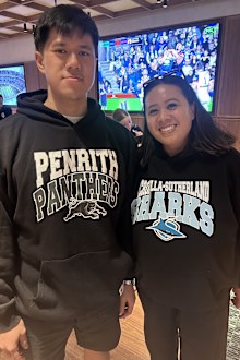 Steven in Sydney watching Panthers vs Sharks in Kmart hoodies, NRL merch