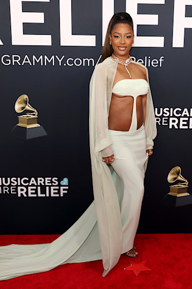 sheer dress at grammys 2025 Chrissy Teigen Debuted a Blunt Bob the BiancaCensori's #Grammy 2025 outfit: What's