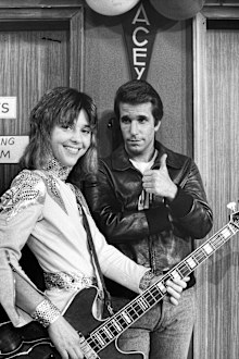Henry Winkler as Fonzie and Suzi Quatro as Leather Tuscadero on Happy Days.