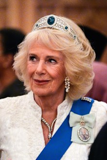 Queen Camilla wearing the Greville Emerald Kokoshnik Tiara
