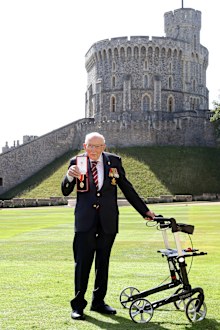 Captain Sir Thomas Moore poses after being awarded with the insignia of Knight Bachelor by Queen Elizabeth II at Windsor Castle on July 17, 2020 in Windsor, England. (Photo by Chris Jackson/Getty Images)