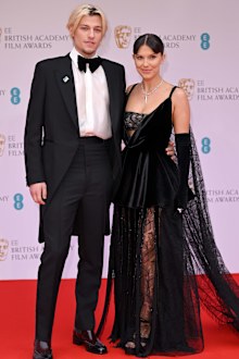 Jake Bongiovi and Millie Bobby Brown attend the EE British Academy Film Awards 2022 at Royal Albert Hall on March 13, 2022 in London, England. 