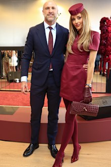 Chris Judd and Rebecca Judd pose for a photo during 2025 Melbourne Cup Day at Flemington Racecourse on November 4, 2025 in Melbourne, Australia.