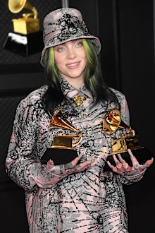 Billie Eilish, winner of Record of the Year for 'Everything I Wanted' and Best Song Written For Visual Media for "No Time To Die", poses in the media room during the 63rd Annual GRAMMY Awards.