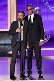 LOS ANGELES, CALIFORNIA - SEPTEMBER 14: (L-R) Ray Romano and Brad Garrett speak onstage during the 77th Primetime Emmy Awards at Peacock Theater on September 14, 2025 in Los Angeles, California.  (Photo by Kevin Winter/Getty Images)