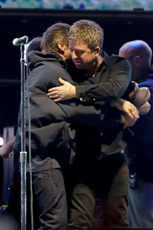 PASADENA, CALIFORNIA - SEPTEMBER 06: (EDITORIAL USE ONLY, NO COMMERCIAL USE, NO SPECIAL INTEREST OR SINGLE ARTIST PUBLICATION USE) (L-R) Liam Gallagher and Noel Gallagher of Oasis perform onstage during the Oasis Live '25 World Tour at Rose Bowl Stadium on September 06, 2025 in Pasadena, California. (Photo by Kevin Winter/Getty Images)