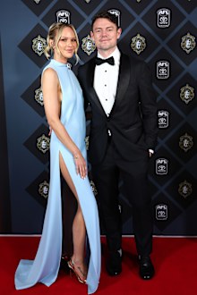 Lachie Neale and Jules Neale arrive at the 2025 Brownlow Medal on September 22, 2025 in Brisbane, Australia. 