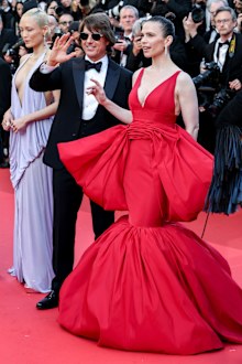 Pom Klementieff, Tom Cruise and Hayley Atwell attend the "Mission Impossible - The Final Reckoning" red carpet at the 78th annual Cannes Film Festival at Palais des Festivals on May 14, 2025 in Cannes, France.
