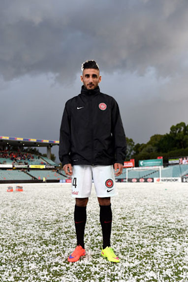 Wanderers striker Kerem Bulut has his picture taken on the strange landscape. (AAP)