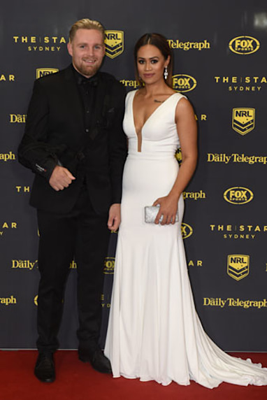 Raider Blake Austin and partner Gillian Alefosio arrive on the red carpet. (AAP)