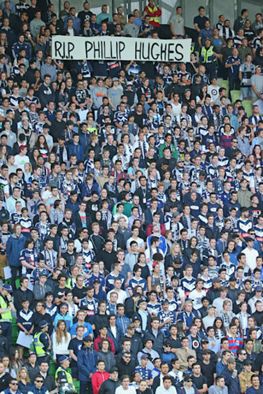 Rival fans rose as one in the 63rd minute of the game.
