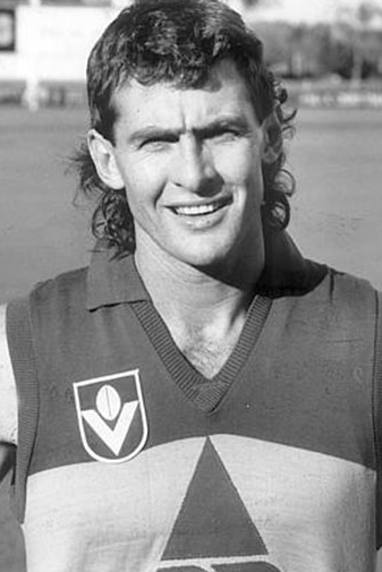 He played 60 games for the Brisbane Bears from 1987 to 1990.
