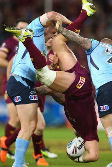 Smith was taken out late after a kick before this lifting tackle on Corey Parker.