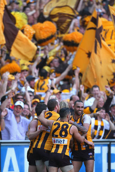 <b>Hawthorn have smashed Sydney in the AFL grand final to confirm their status as one of the modern era's greatest teams.</b><br/><br/>The Hawks unleashed their most unsociable football on Saturday at the MCG and the Swans had no answer to Hawthorn's relentless pressure.<br/><br/>It is Hawthorn's 12th premiership and their first back-to-back flags in 25 years, while captain Luke Hodge became the third player in history to win a second Norm Smith Medal in his 250th match.<br/><br/>