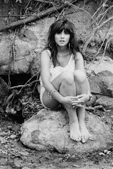 Singer Linda Ronstadt poses for a portrait for her first solo album 'Hand Sown... Home Grown' on March 1, 1968 in Topanga, California