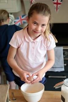 Princess Charlotte breaks the eggs