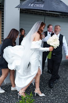 Kristine Sattore working as a wedding content creator.