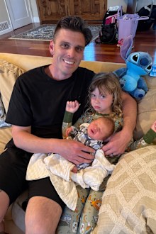 Kevin Miller, daughter Emma and newborn son Jackson