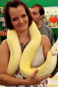 Laura Hurst was found dead with a 2.4 metre python wrapped around her neck on Wednesday.