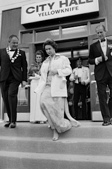 Queen Elizabeth II wearing the aquamarine ribbon tiara and Prince Philip leave Yellowknife City Hall in the Northwest Territories during a royal tour of Canada, July 1970. (Photo by David Cairns/Express/Getty Images)