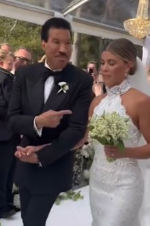 Lionel Richie walking Sofia down the aisle