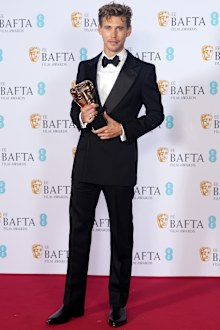 Austin Butler poses with the Leading Actor Award for his performance in 'Elvis' during the 2023 EE BAFTA Film Awards, held at the Royal Festival Hall on February 19, 2023 in London 