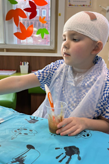 Darcey had life-saving brain surgery and is recovering well.