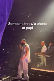 Drake being hit by a fan's phone