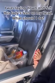 Feet on seat during flight